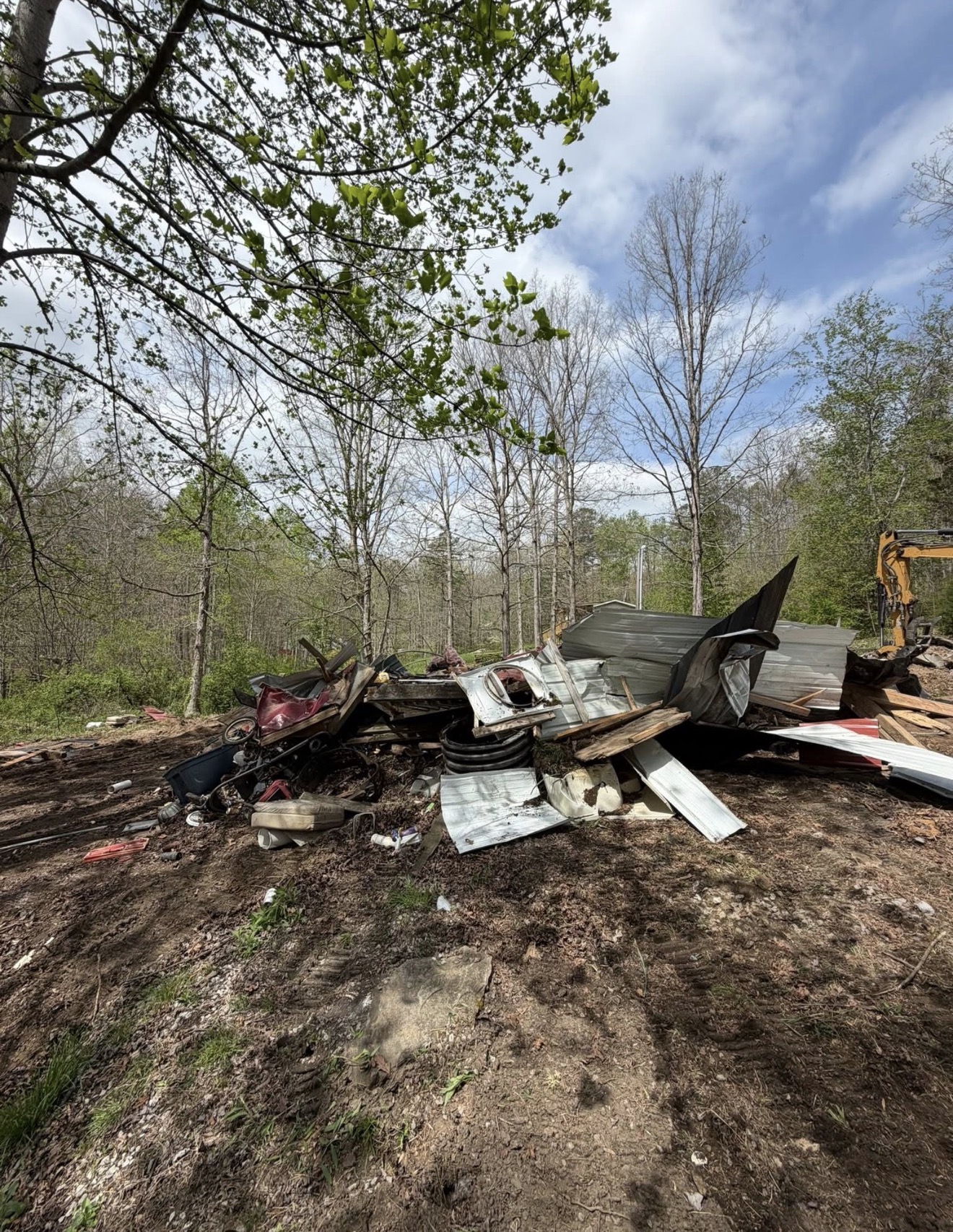 Demolition debris staged for cleanup